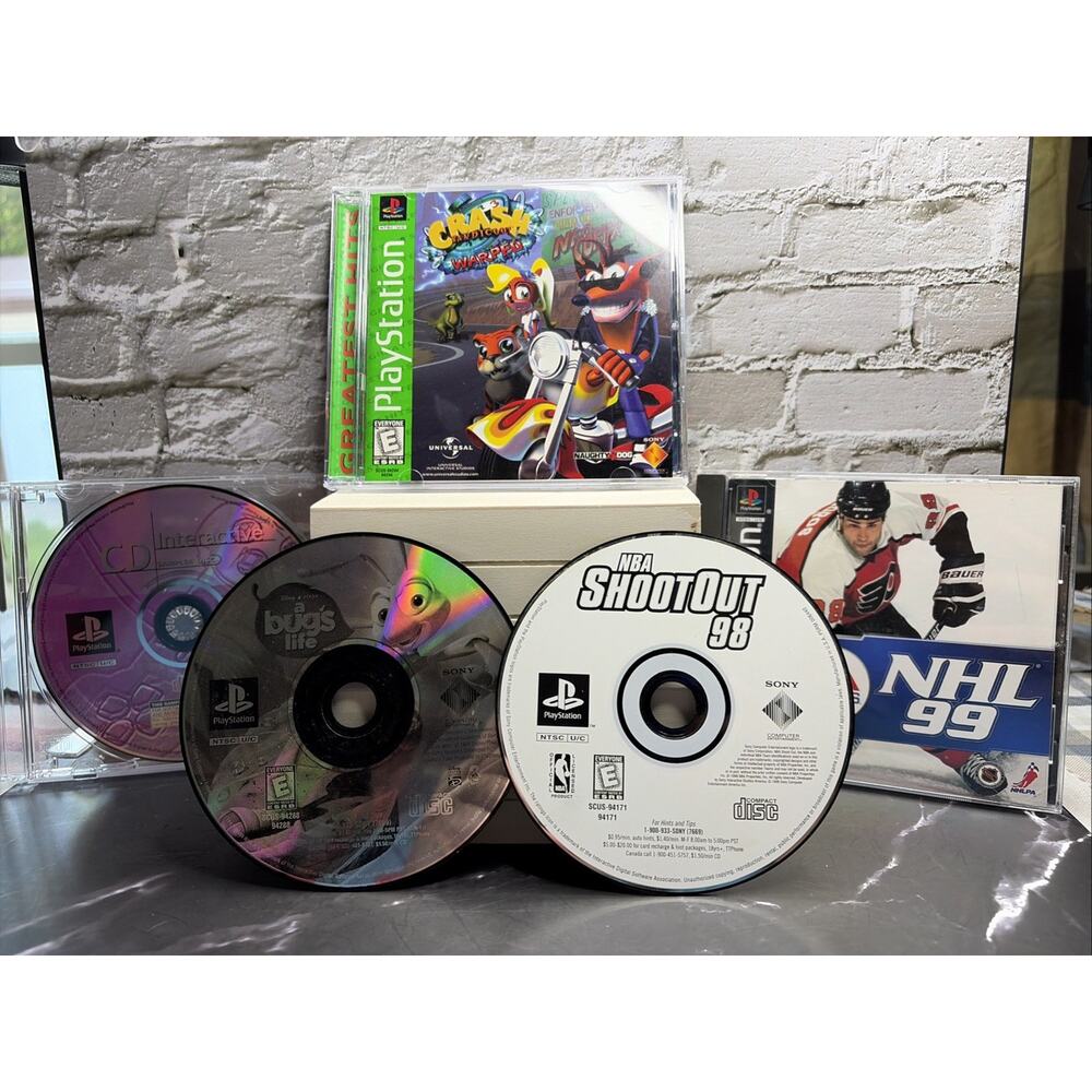 PS1 Lot - Crash Bandicoot 3, NHL 99, A Bugs Life, NBA Shoot 98, Interactive Vol9